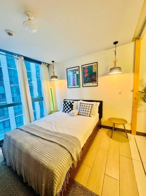 One Uptown Residences Bgc Тагиг Экстерьер фото