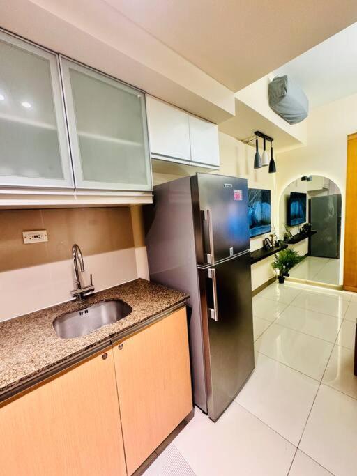 One Uptown Residences Bgc Тагиг Экстерьер фото