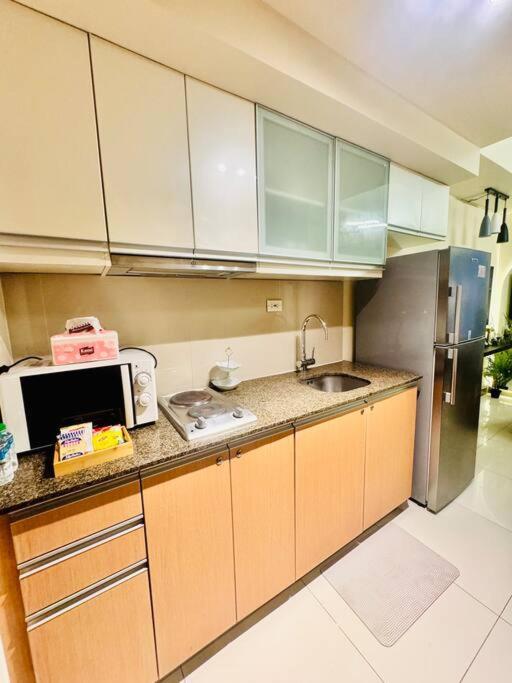 One Uptown Residences Bgc Тагиг Экстерьер фото