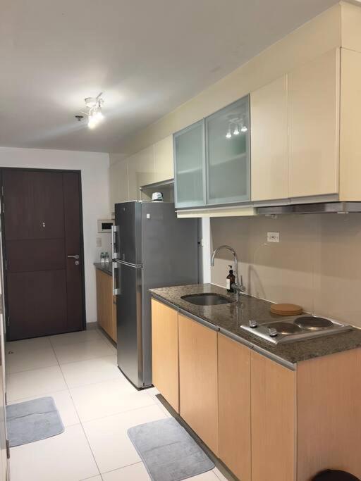 One Uptown Residences Bgc Тагиг Экстерьер фото