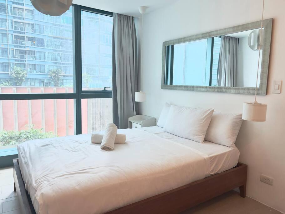 One Uptown Residences Bgc Тагиг Экстерьер фото